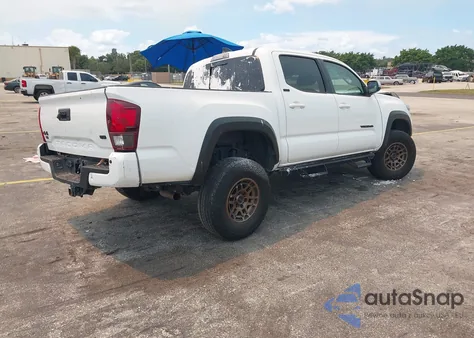 2023 Toyota Tacoma Trail Edition из США, поврежденный, VIN 3TMCZ5AN8PM606325